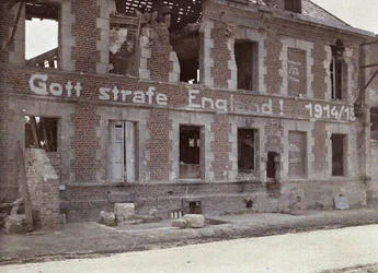 German Army Slogan on the Wall of a Damaged Brick Building: May God Punish England! 191415, Bucy-le-Long, Aisne, France